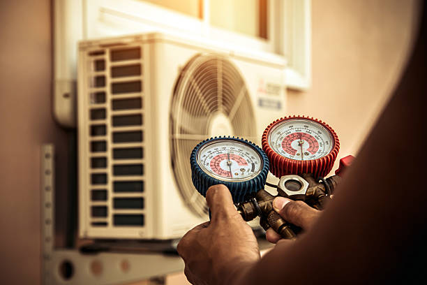 Professional Hvac technician working in Grand Junction, MI